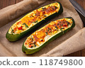 Zucchini stuffed with feta cheese, egg, parsley and cherry tomatoes 118749800