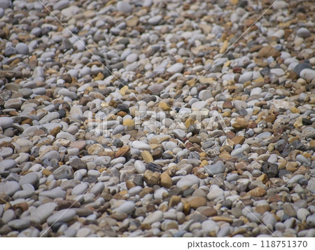 Small stones at the beach Small stones at the beach 118751370