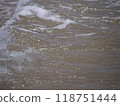 Ocean waves breaking at the beach 118751444
