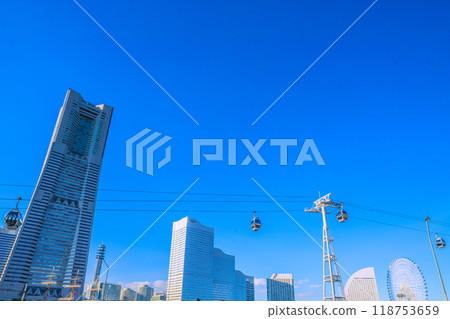 Yokohama cityscape in Japan in September. View of Yokohama Landmark Tower and the Minato Mirai district. Sakuragicho Station is in the background on the left (26th) Yokohama cityscape in Japan in September. View of Yokohama Landmark Tower and the Minato Mirai district. Sakuragicho Station is in the background on the left (26th) 118753659