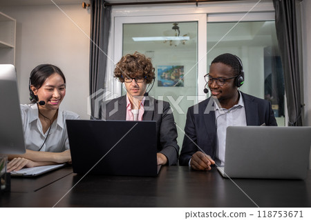Team multiethnic call center worker and operators with headset and computer Team multiethnic call center worker and operators with headset and computer 118753671