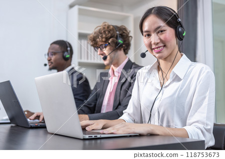 Team multiethnic call center worker and operators with headset and computer 118753673