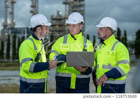 Team professional electrical engineer safety uniform working together power plant 118753680