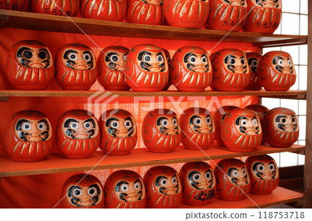 A large number of Daruma dolls lined up at the temple A large number of Daruma dolls lined up at the temple 118753718