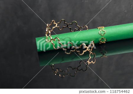 Bracelets. Women's jewelry on a dark background. Metal products. Fashion. 118754462