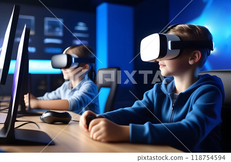Interactive school concept. Kids in VR headsets sitting at desks and having virtual reality learning experience. Study technology. Kids in VR glasses in classroom. Tech education. 118754594