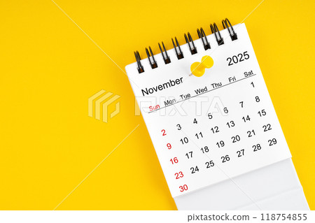 November 2025 Monthly desk calendar for 2025 year with thumbtack. November 2025 Monthly desk calendar for 2025 year with thumbtack. 118754855