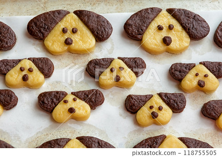 Cookies in the form of dogs in the form for baking Cookies in the form of dogs in the form for baking 118755505