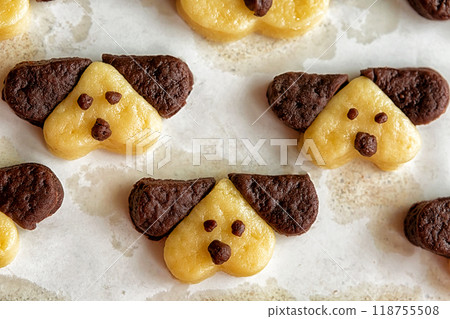 Cookies in the form of dogs in the form for baking Cookies in the form of dogs in the form for baking 118755508
