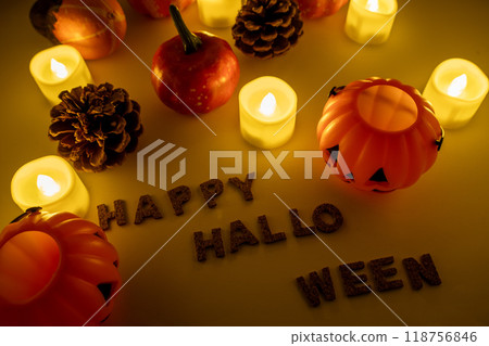 Warm candles on Halloween night 118756846