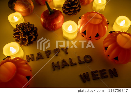 Warm candles on Halloween night 118756847