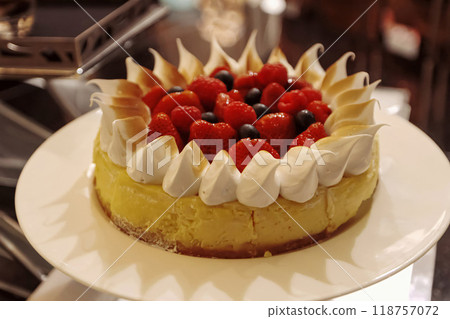 Beautiful multicolored decorated baked sweet tasty party cakes or catering cakes for party, bar dessert selection with cake, pie and pastries catering banquet, coffee break buffet at a conference 118757072