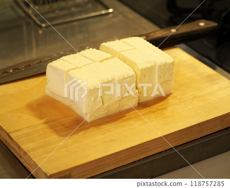 Tofu on a cutting board Tofu on a cutting board 118757285