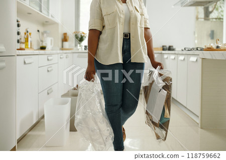 Carrying Eco-Friendly Bags in Modern Kitchen Setting Carrying Eco-Friendly Bags in Modern Kitchen Setting 118759662