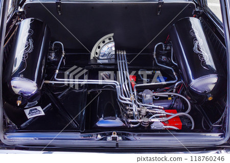 15.09.2024. Novosibirsk, Midday, Open car trunk with installation receiver, compressor for pneumatic cylinder. For wall projects, tuning machines, close up photo 118760246