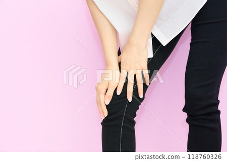 Woman worried about foot pain 118760326