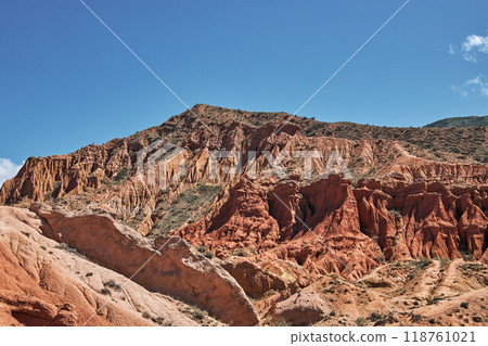 Fairytale canyon with red rocks. Picturesque Skazka canyon, Kyrgyzstan 118761021