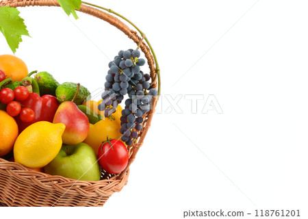 vegetables and fruits in a wicker basket isolated on a white background. Free space for text. 118761201