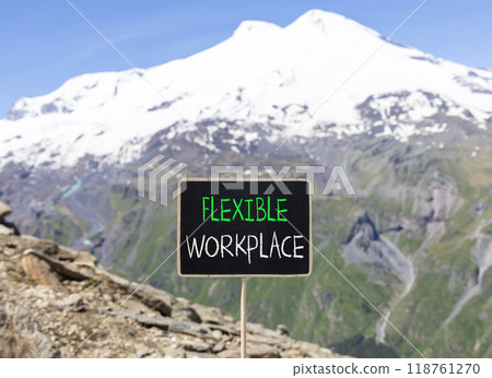 Flexible workplace symbol. Concept words Flexible workplace on beautiful yellow blackboard. Beautiful mountain Elbrus background. Business Flexible workplace concept. Copy space. 118761270