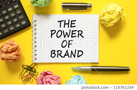The power of brand symbol. Concept words The power of brand on beautiful white note. Beautiful yellow background. Calculator. Business the power of brand concept. Copy space. The power of brand symbol. Concept words The power of brand on beautiful white note. Beautiful yellow background. Calculator. Business the power of brand concept. Copy space. 118761284