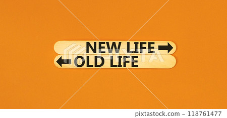 New or old life symbol. Concept word New life Old life on beautiful wooden stick. Beautiful orange table orange background. Business and new or old life concept. Copy space. 118761477