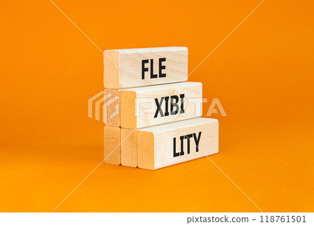 Flexibility symbol. Concept word Flexibility on beautiful wooden blocks. Beautiful orange background. Business flexibility concept. Copy space. 118761501