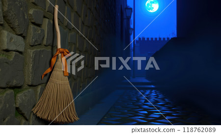 Halloween broom with orange ribbon in moonlit alley 118762089