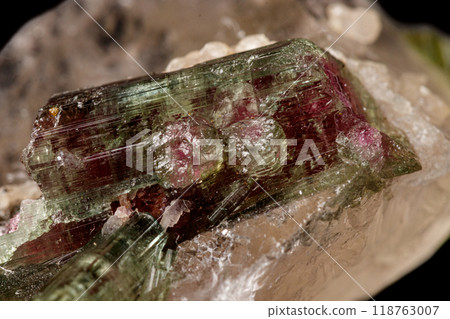 Macro stone tourmaline mineral on a black background  118763007