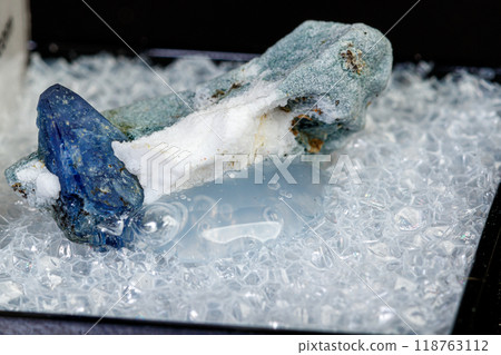 macro mineral stone Benitoite on a black background 118763112