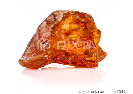 Macro stone amber mineral on white background 118763163