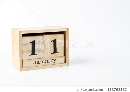 Wooden calendar January 11 on a white background 118763182