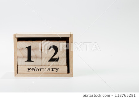 Wooden calendar February 12 on a white background 118763281