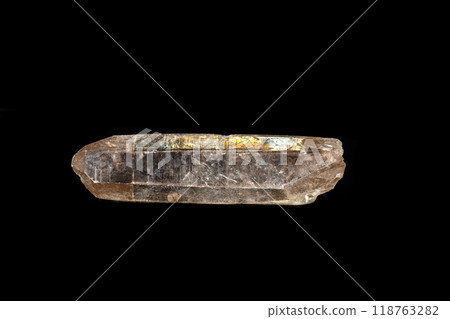 Macro mineral stone smoky quartz, rauchtopaz on a black background 118763282