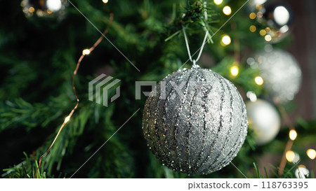 silver ball as decoration on a Christmas tree 118763395