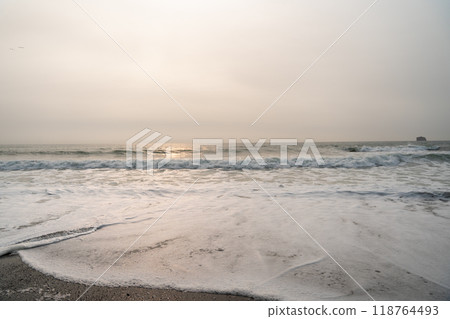 A beautiful view of giant rocks and ocean at Rialto Beach on a cloud day. A beautiful view of giant rocks and ocean at Rialto Beach on a cloud day. 118764493