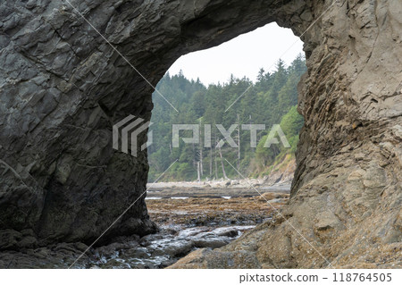A beautiful view of giant rocks and ocean at Rialto Beach on a cloud day. A beautiful view of giant rocks and ocean at Rialto Beach on a cloud day. 118764505