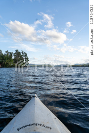 A beautiful view looking out from a kayak on Conway Lake in New Hampshire. 118764522