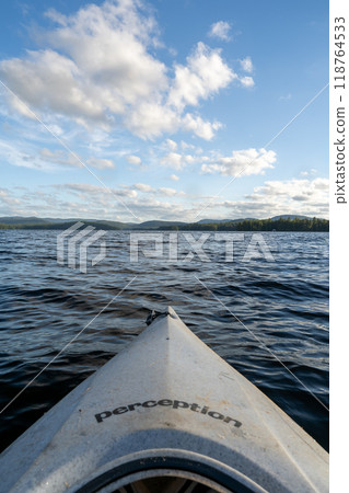 A beautiful view looking out from a kayak on Conway Lake in New Hampshire. 118764533