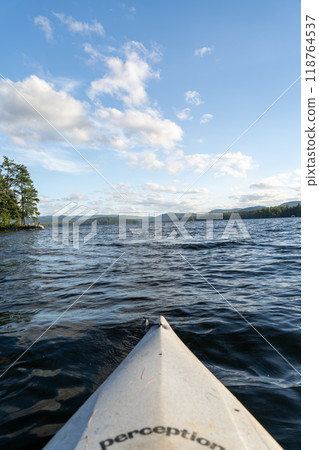 A beautiful view looking out from a kayak on Conway Lake in New Hampshire. 118764537