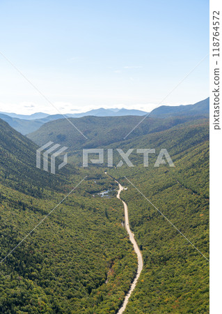 A beautiful view of mountains in White Mountain National Forest. A beautiful view of mountains in White Mountain National Forest. 118764572