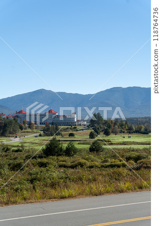 A beautiful view of the Mt. Washington Resort with mountains in the background. 118764736