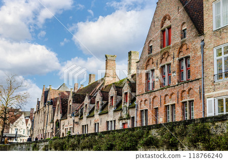 Bruges, Belgium; view of the medieval buildings that are crossed by the canals of the city. Historic center World Heritage 118766240