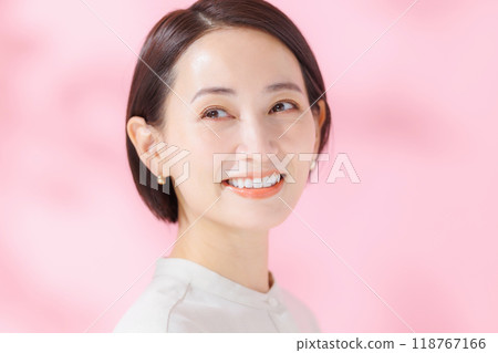 Female portrait pink back 118767166