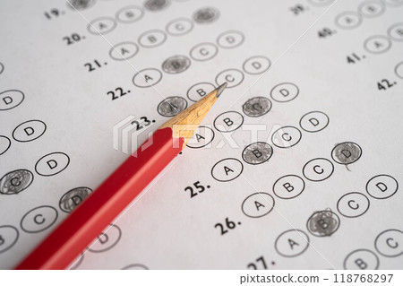 Answer sheets with pencil drawing fill to select choice education. 118768297