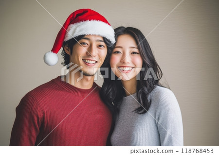 Japanese couple wearing Santa hats and enjoying Christmas (lovers, dating, matchmaking, matching app, winter clothes, 118768453