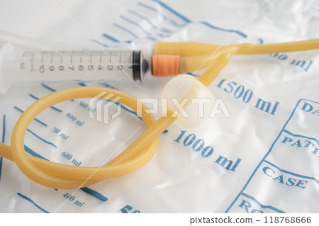 Foley catheter and urine drainage bag collect urine for disability or patient in hospital. Foley catheter and urine drainage bag collect urine for disability or patient in hospital. 118768666