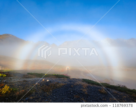 Climbing Mt. Karamatsu in autumn (Brocken phenomenon) Climbing Mt. Karamatsu in autumn (Brocken phenomenon) 118769378