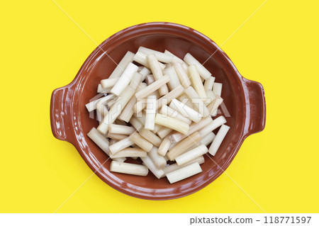 Fresh lotus rootlet on yellow background. 118771597