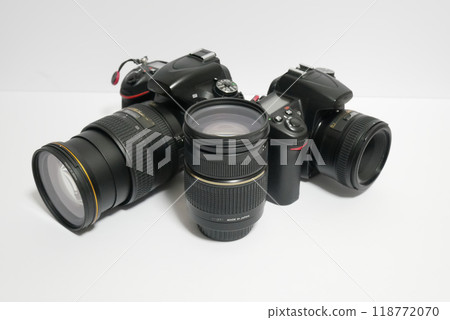 Digital SLR camera and lenses on a white background 118772070