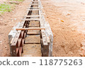 concrete drainage gutter on construction site on road 118775263